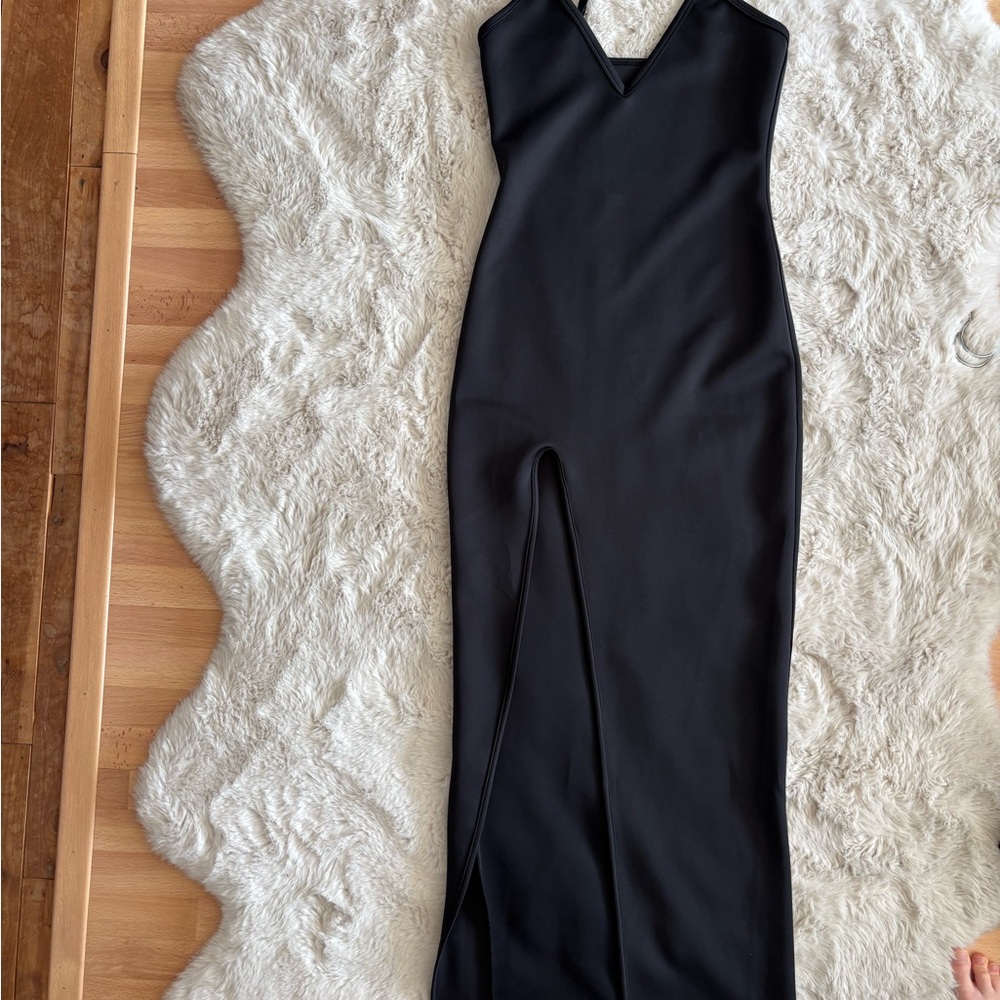 Elegant Black Sleeveless Dress with a Slit